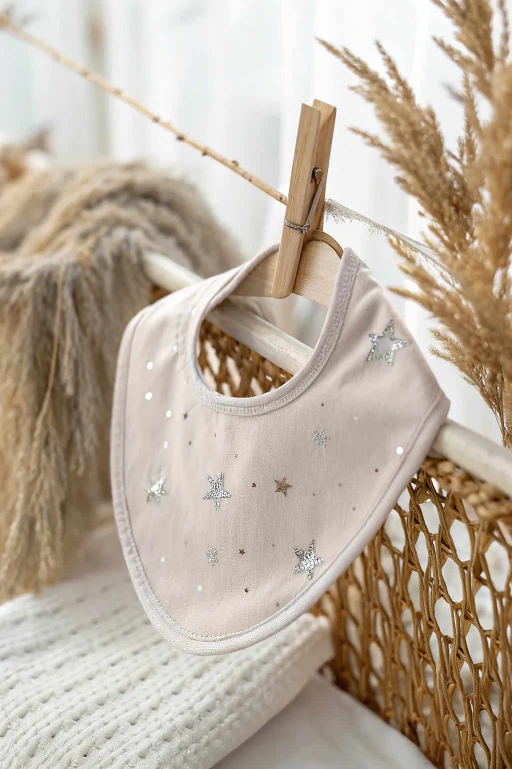 Add a touch of sparkle to your baby's special day with this stunning, handcrafted bib!