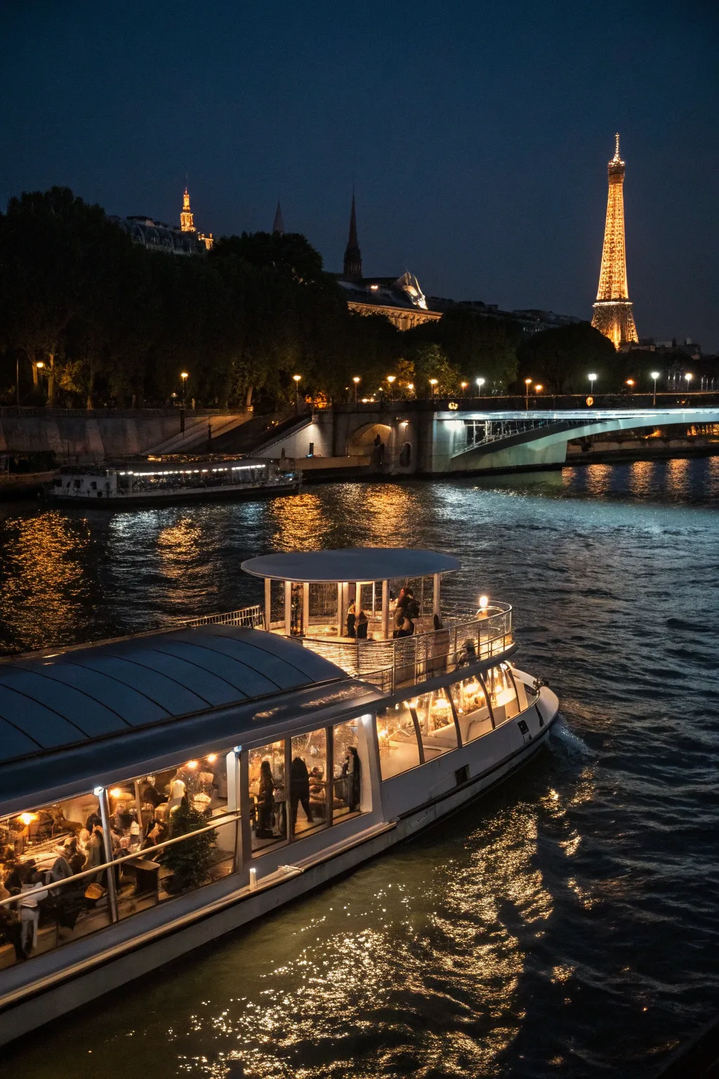 Enjoy a chic dinner cruise with Paris's illuminated skyline.