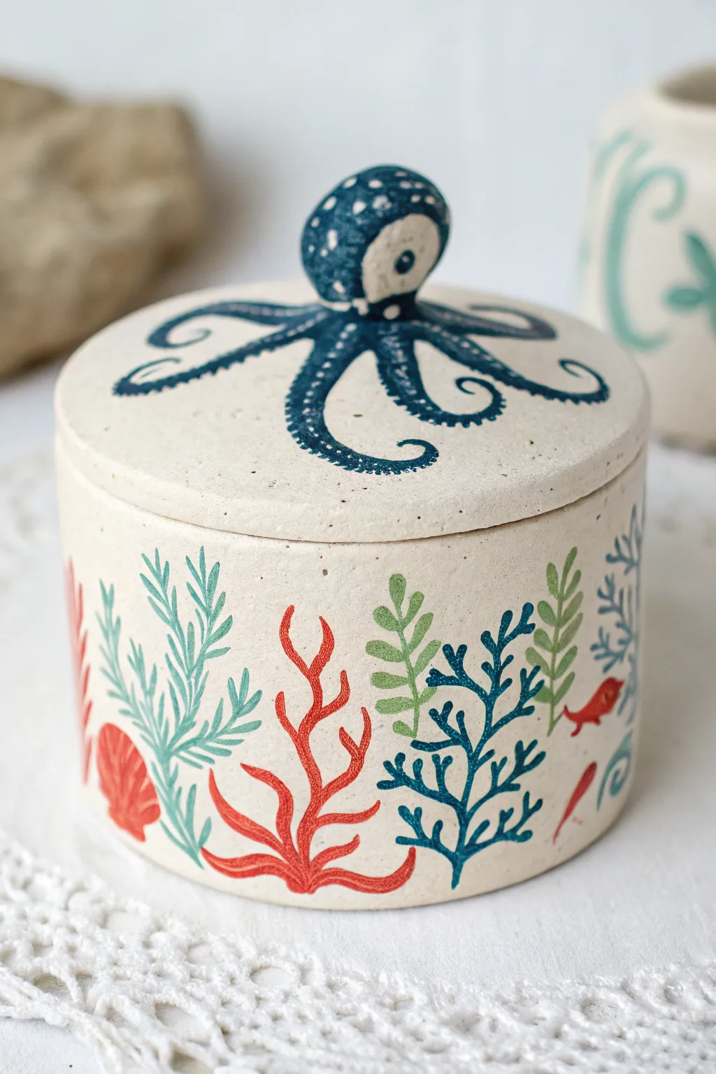 Dive into elegance with this handcrafted clay box, perfect for adding a touch of the ocean to your decor.