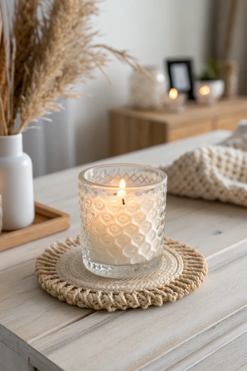 Embrace winter's glow with a frosted candle holder that lights up your space with minimalist charm.