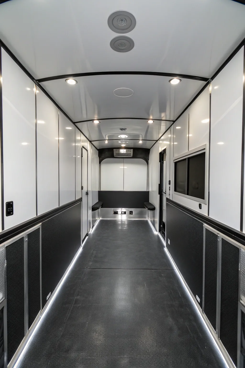 Embrace the elegance of minimalism with a monochrome palette in your trailer's interior design. #MinimalistStyle #MonochromeElegance