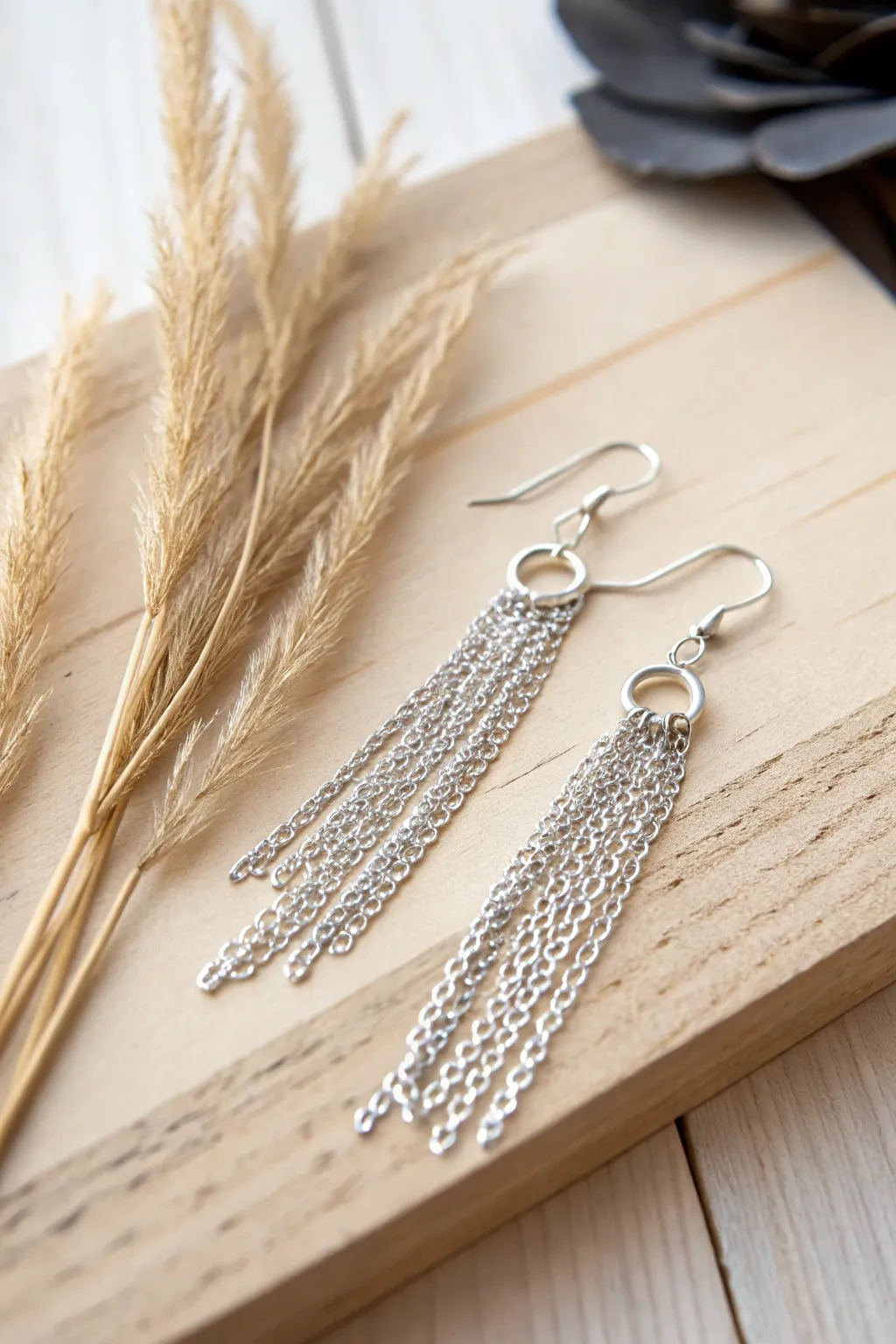 Elevate your look with these stunning chain fringe earrings – the perfect blend of elegance and bohemian charm.