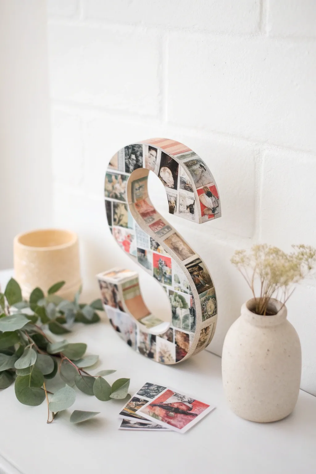 Craft your story with style: a scrapbook-inspired 'S' for your space.