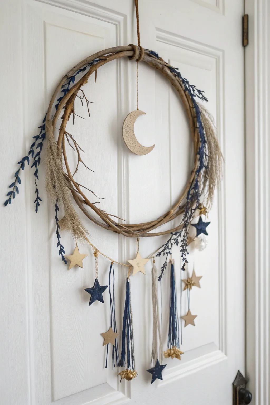 Invite cosmic elegance to your doorstep with this celestial wreath, where minimalist design meets boho charm.
