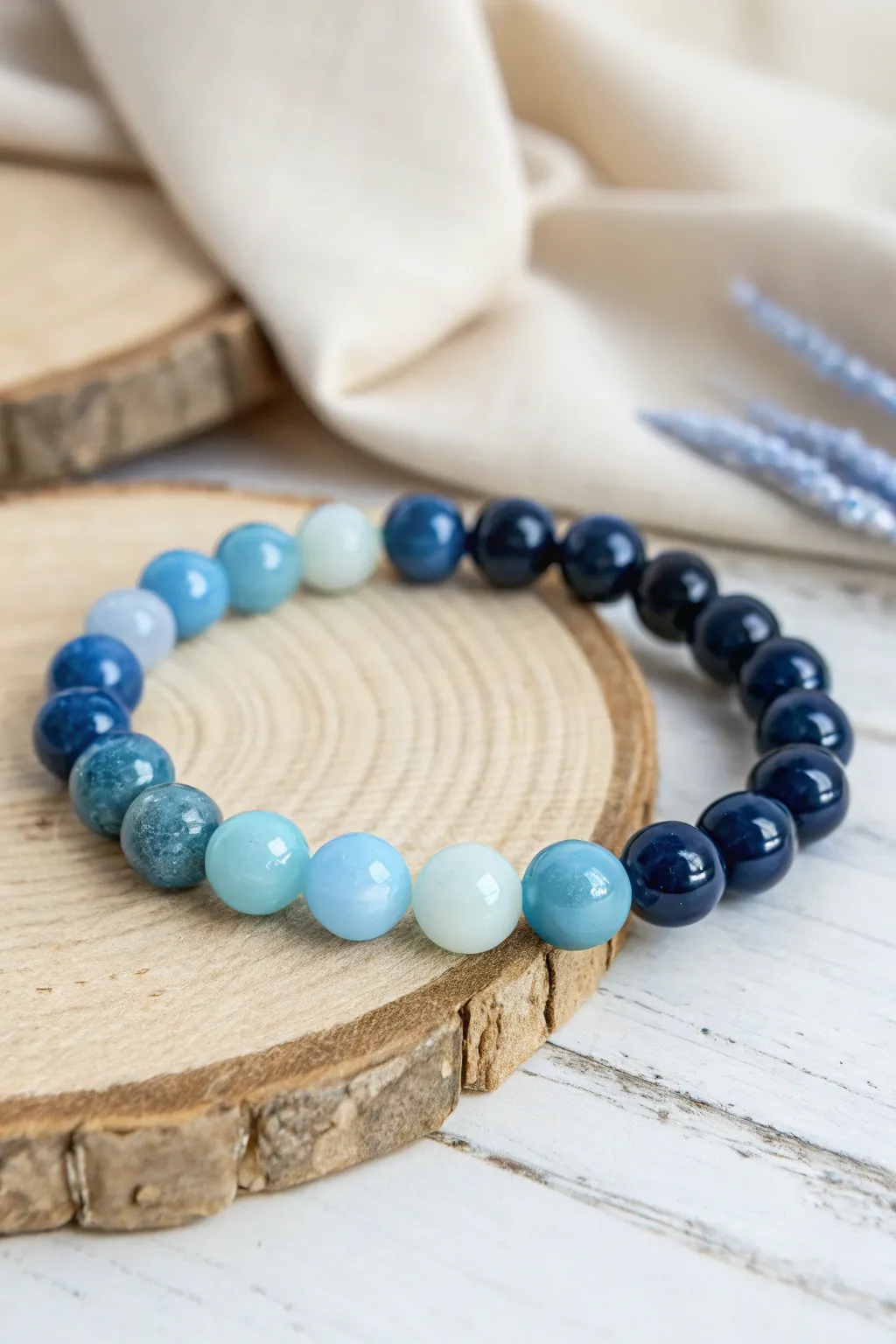 Embrace the serene elegance of a monochrome bead bracelet in shades of blue. A perfect blend of simplicity and style.