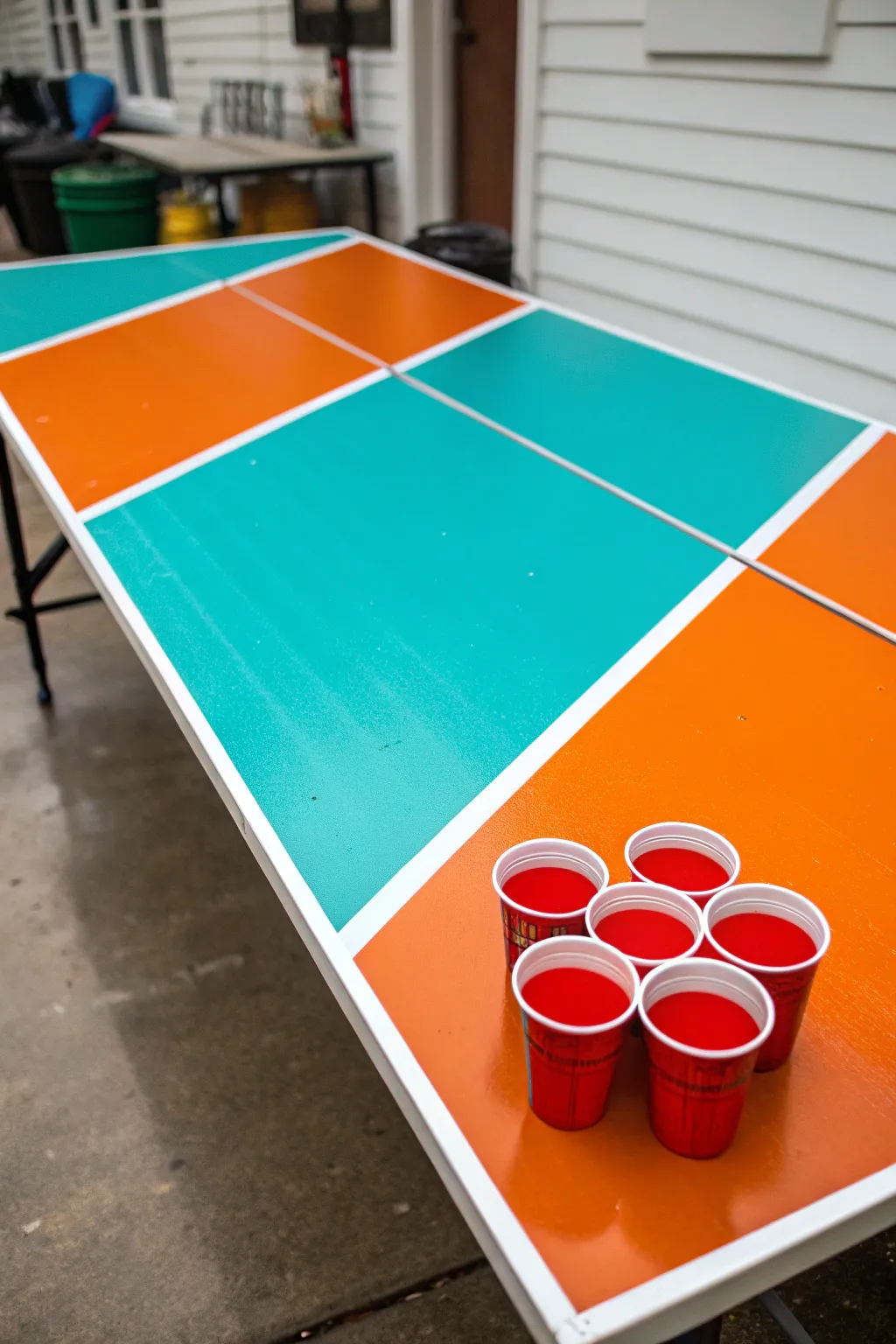 Elevate your game night with a handcrafted beer pong table bursting with vibrant color blocks.