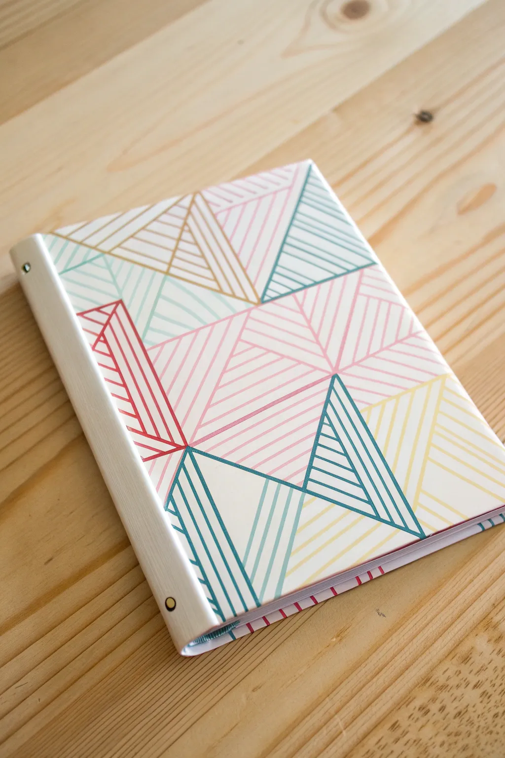 Transform your binder into a geometric wonder with washi tape magic – where minimalism meets creativity.