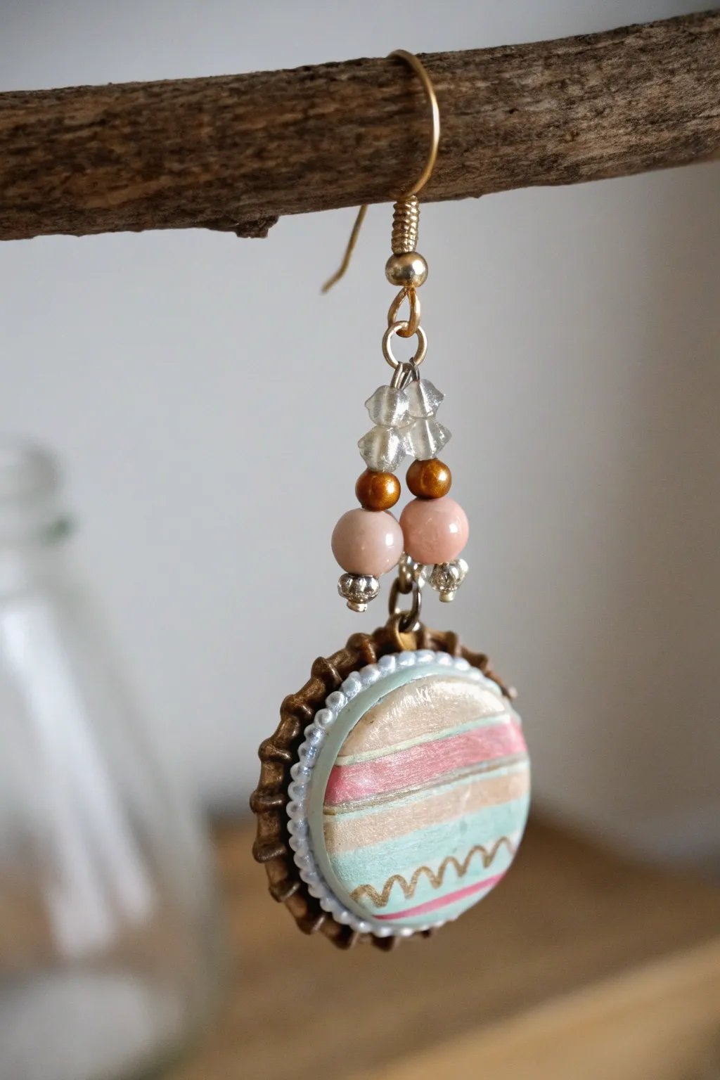 Transform bottle caps into stunning boho earrings with a touch of Scandinavian simplicity.