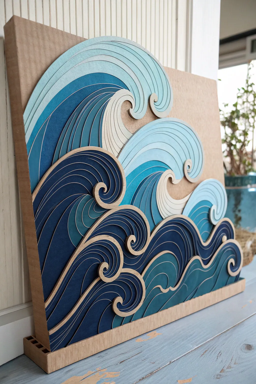 Dive into the serene beauty of the ocean with this captivating cardboard wave sculpture.