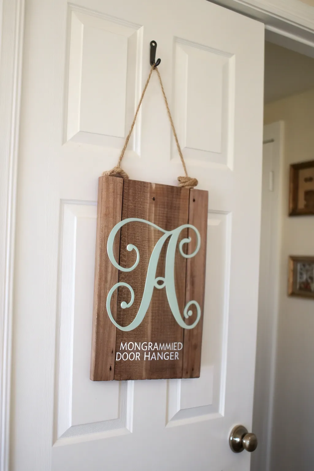 Welcome home with elegance: A monogrammed door hanger that marries simplicity with personal charm.