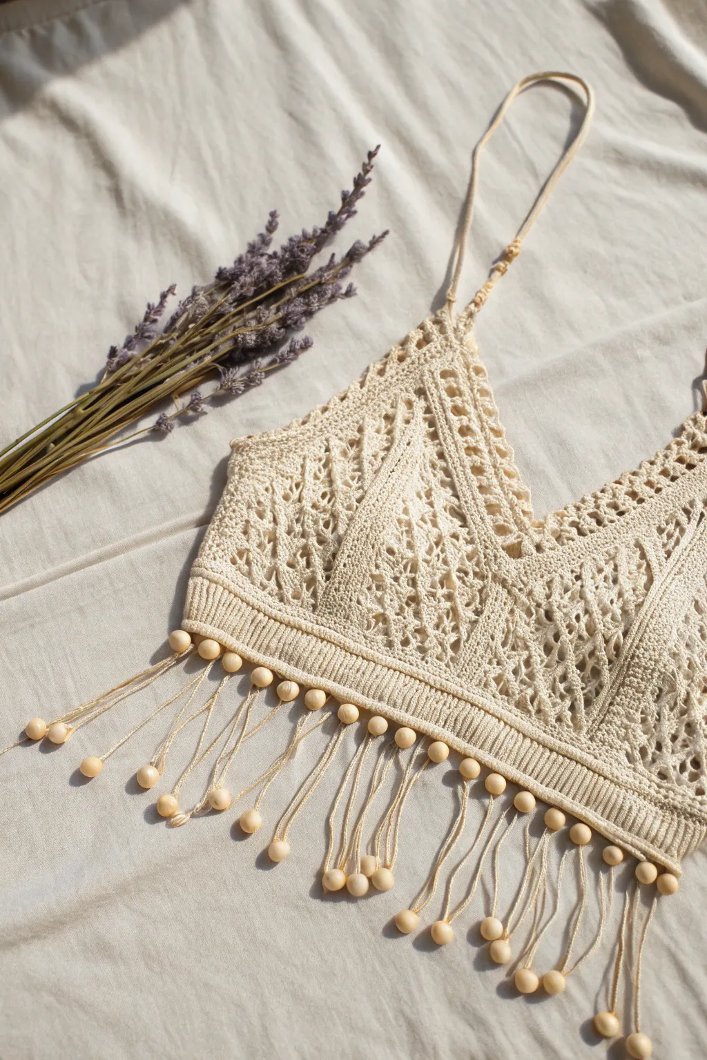 Embrace boho vibes with this handcrafted crochet crop top, perfect for your next festival adventure.