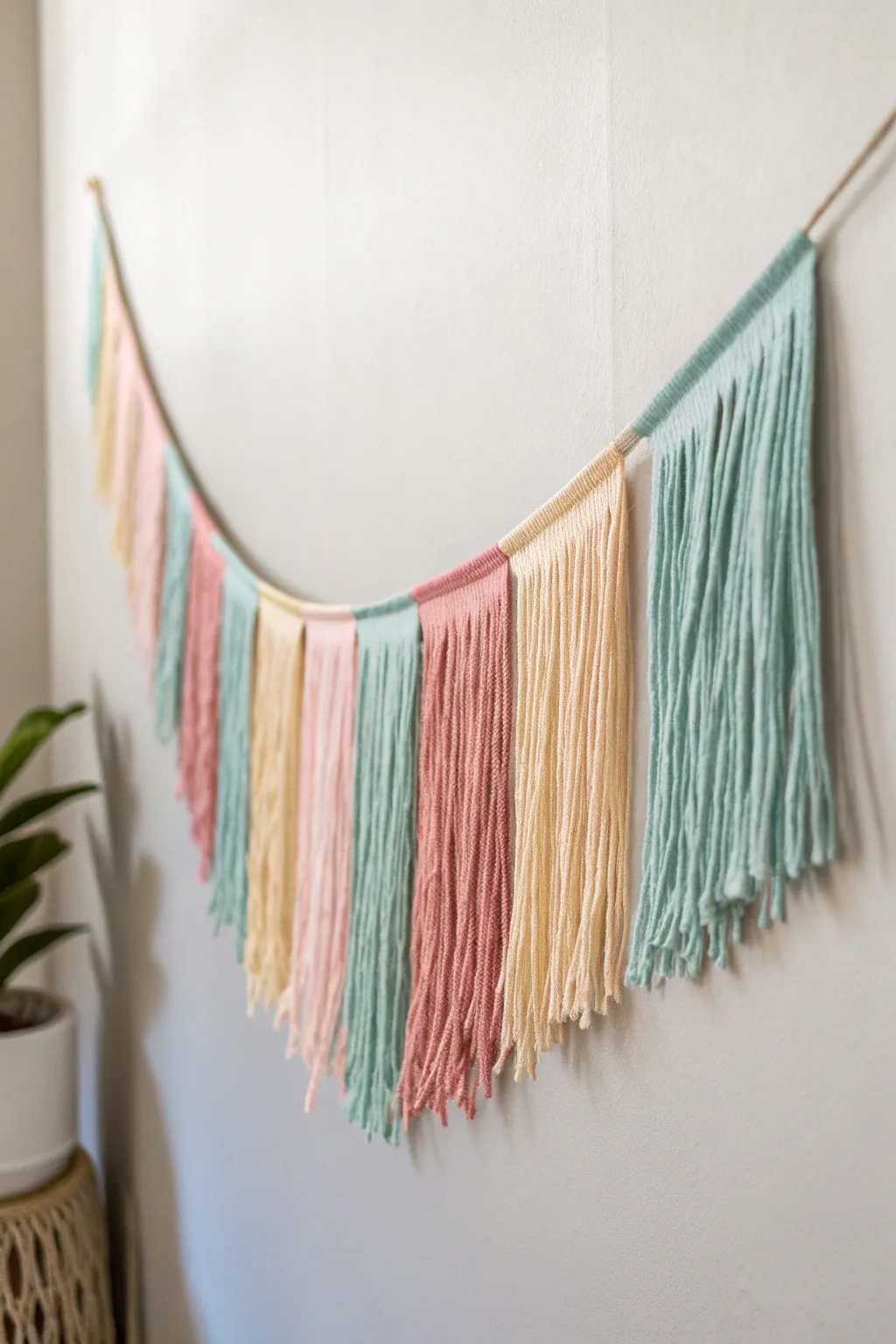 Add a touch of whimsical elegance to your space with this DIY fringe banner – where craft meets charm!