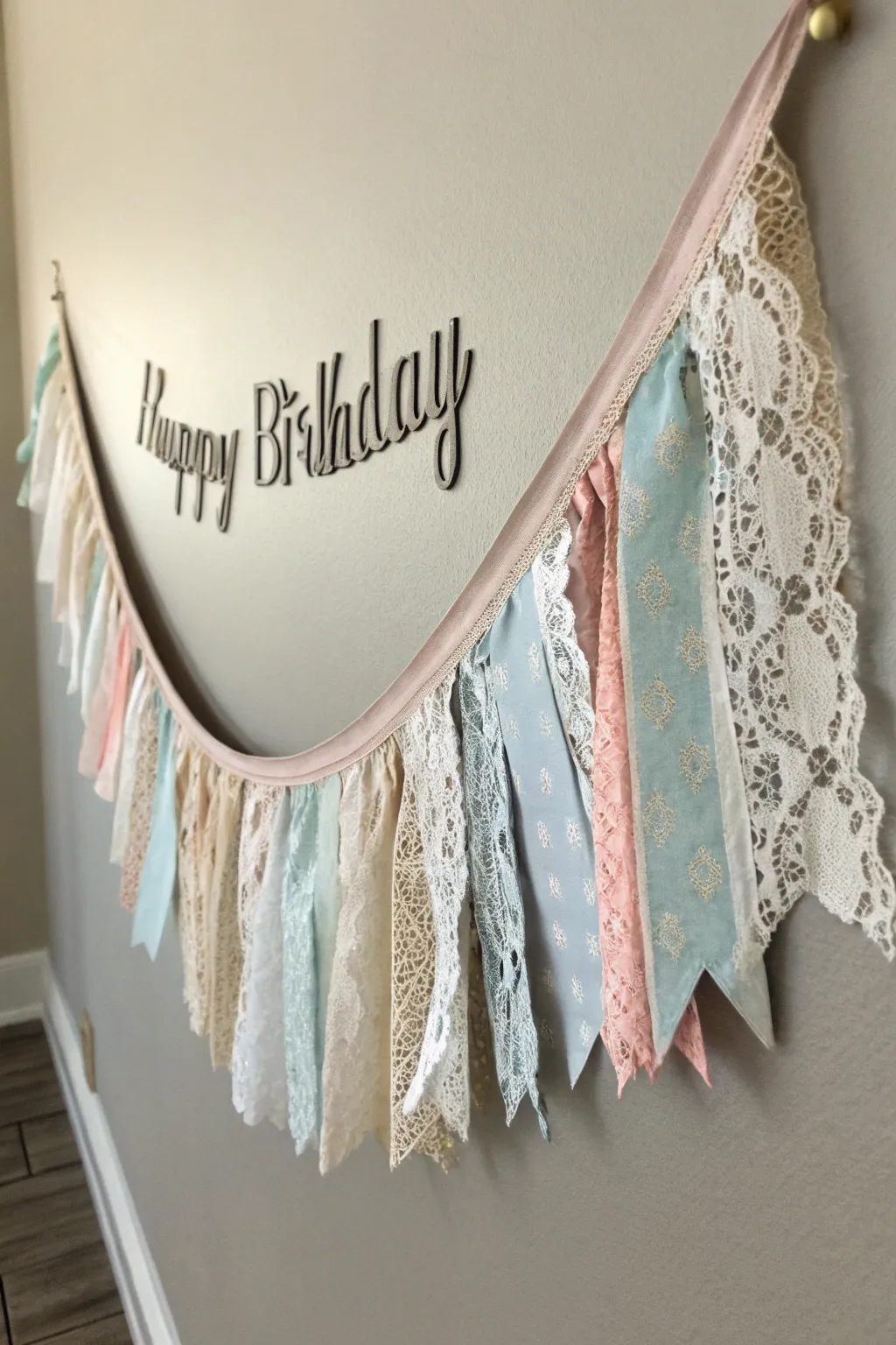 Embrace sustainable elegance with a shabby chic birthday banner crafted from fabric scraps and vintage lace. 🎈✨ #DIYDecor #ShabbyChic