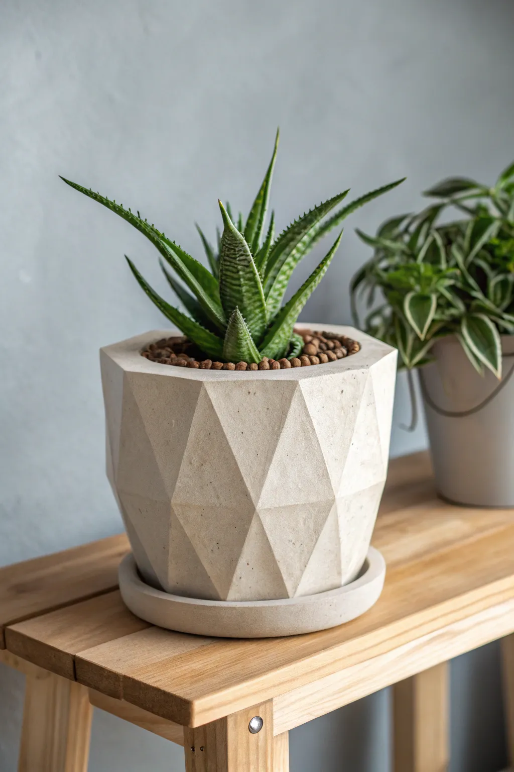 Transform your space with geometric clay wonders – a modern art piece for your shelf!