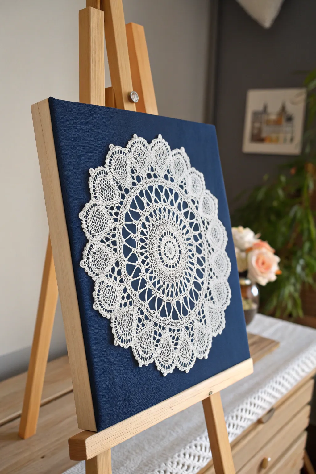 Elevate your space with the elegance of doily art against a rich navy backdrop.