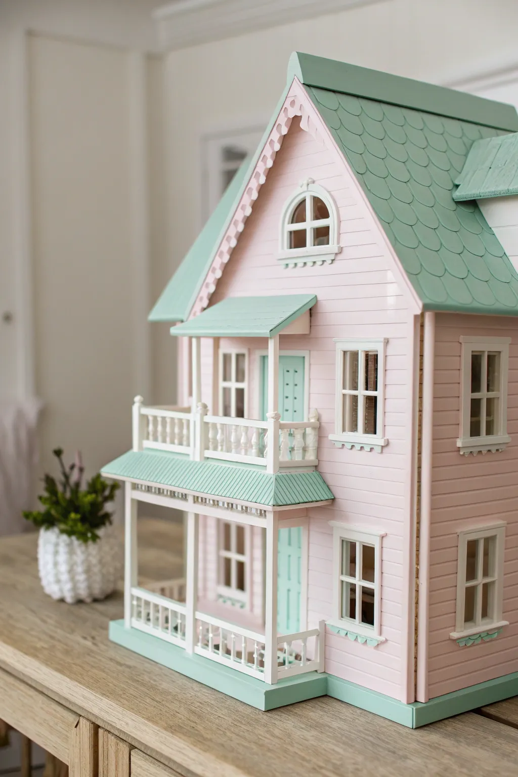 Step into a pastel paradise with this charming dollhouse exterior, where soft hues meet minimalist elegance.