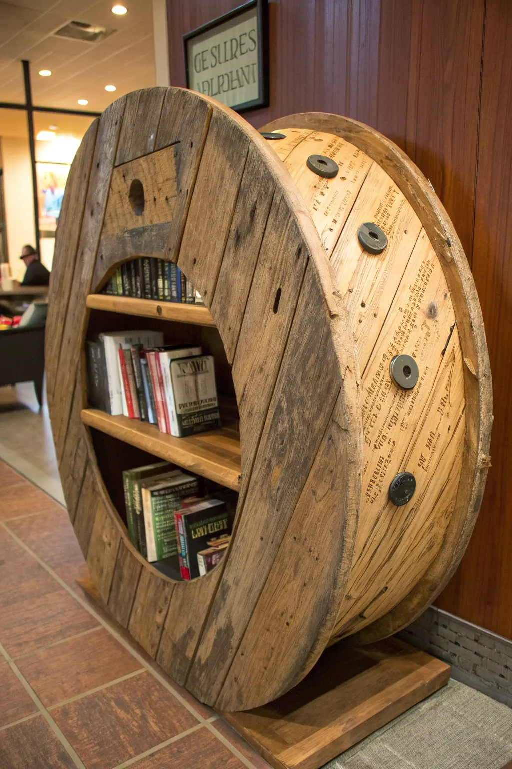 Transform vintage spools into stunning rustic bookshelves that exude charm and craftsmanship.