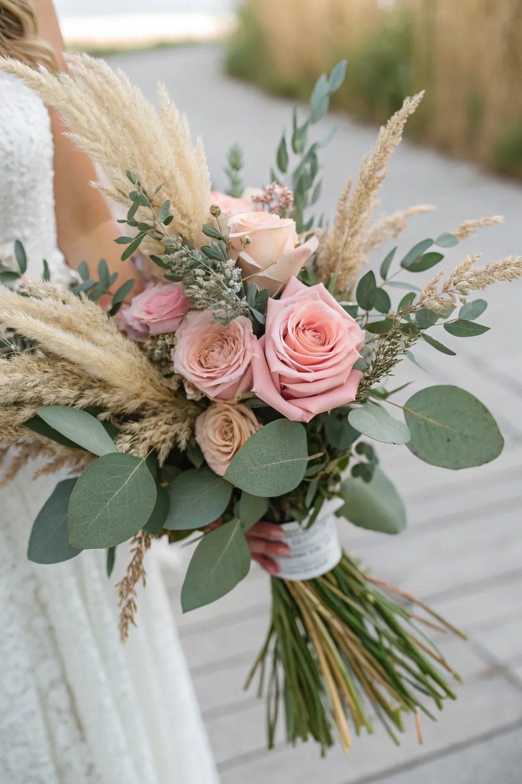 Wheat and pampas grass offer a rustic charm perfect for autumnal aesthetics.