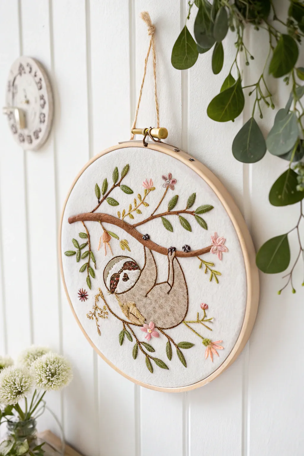 Bring a touch of nature indoors with this whimsical sloth embroidery. Perfect for adding serenity to your minimalist space.