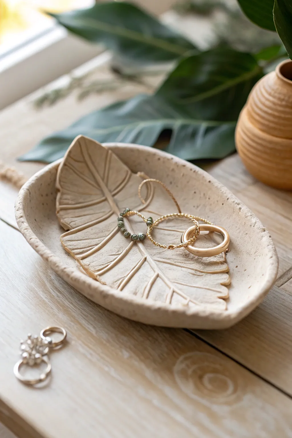 Elevate your mom's vanity with a handmade clay jewelry dish that exudes natural beauty and minimalist elegance.
