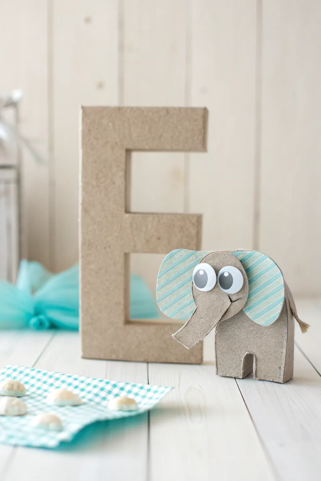 Transform the letter 'E' into an enchanting elephant with a minimalist touch. Perfect for the craft-loving minimalist!