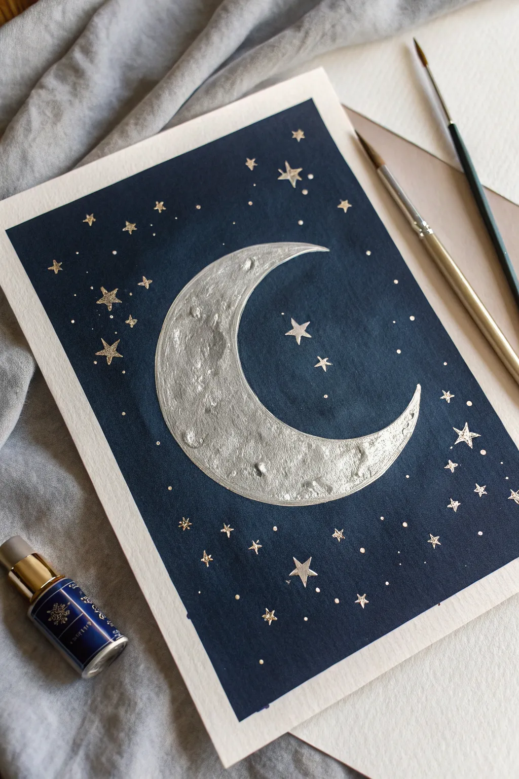 Embrace the mystique of the cosmos with a metallic moon masterpiece.