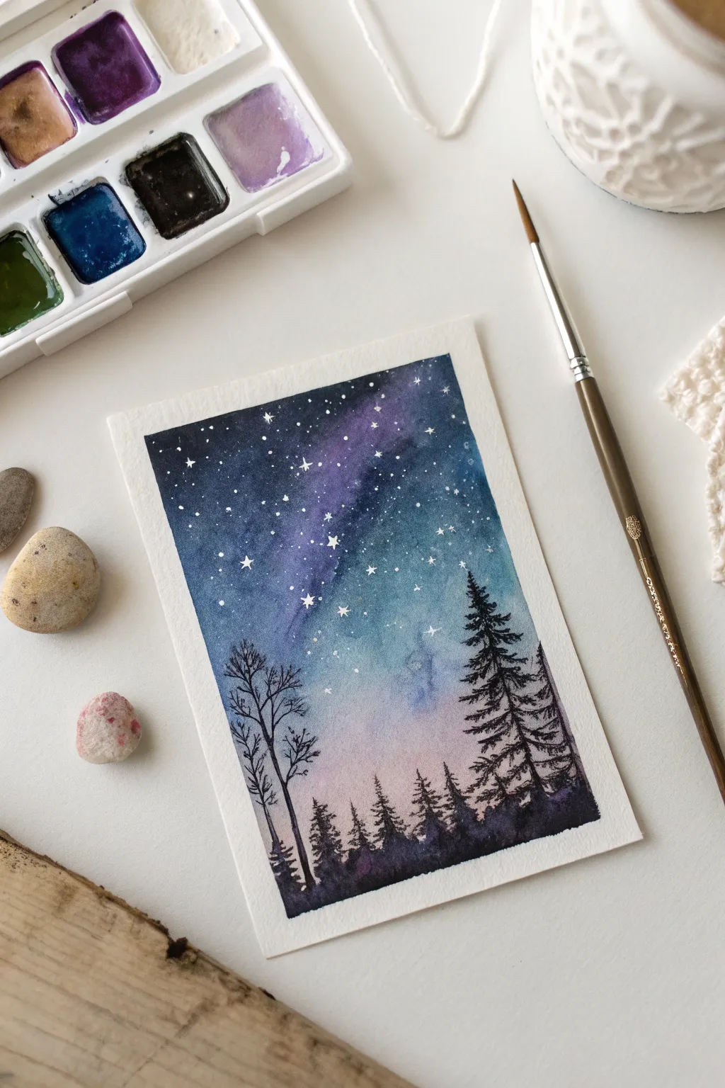 Capture the cosmos on a canvas no bigger than your palm. Dive into the art of miniature night skies and let your creativity shine!