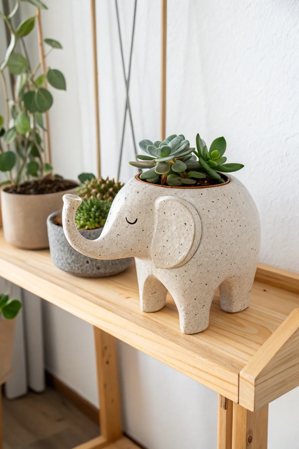 Add a playful touch to your decor with this whimsical elephant ceramic pot. Perfect for lovers of minimalist and Boho styles.