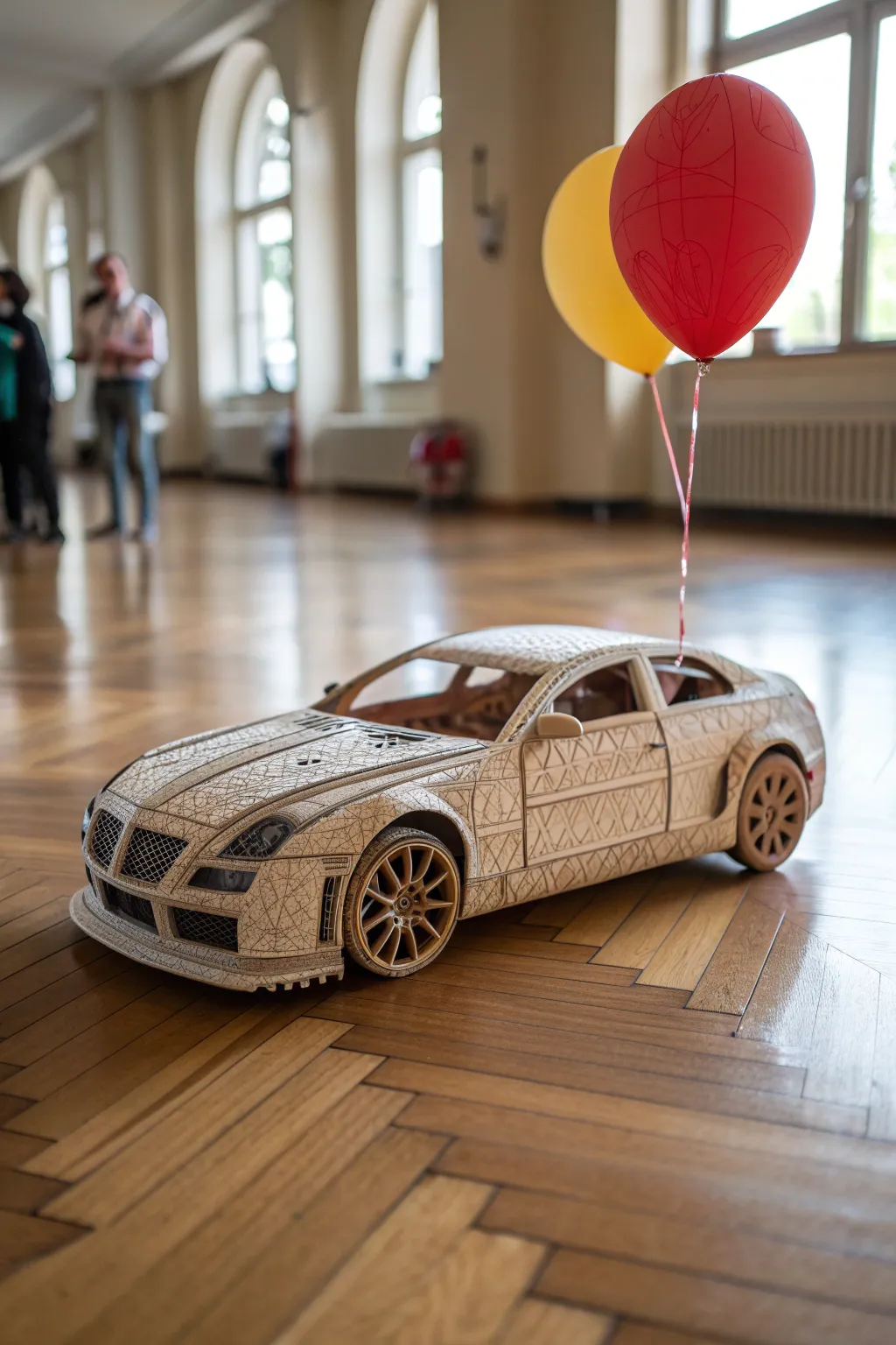 Ready, set, zoom! Witness the craftsmanship of a balloon-powered paper car race to the finish line.
