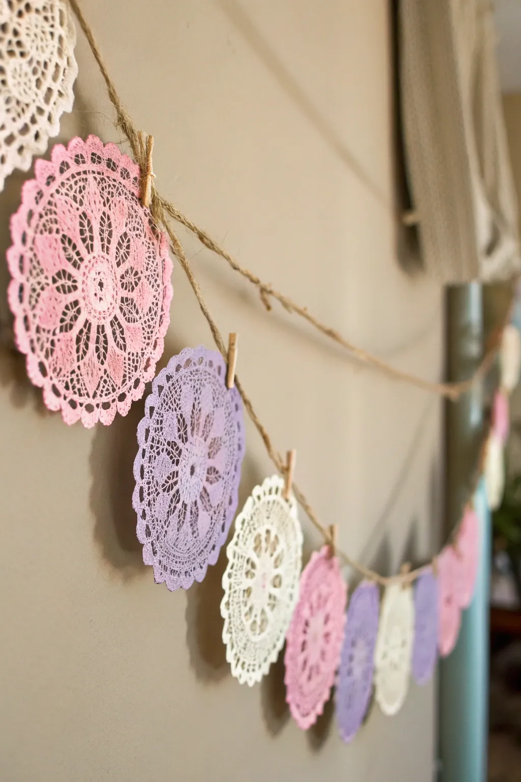 Elevate your Valentine's decor with a charming doily garland that whispers simplicity and elegance.
