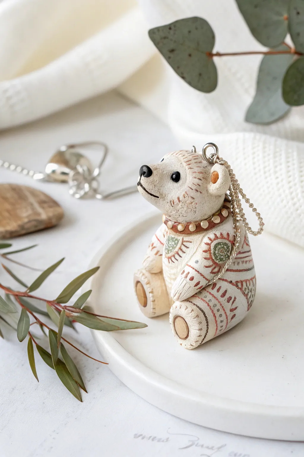 Embrace the charm of handcrafted whimsy with this delightful bear companion.