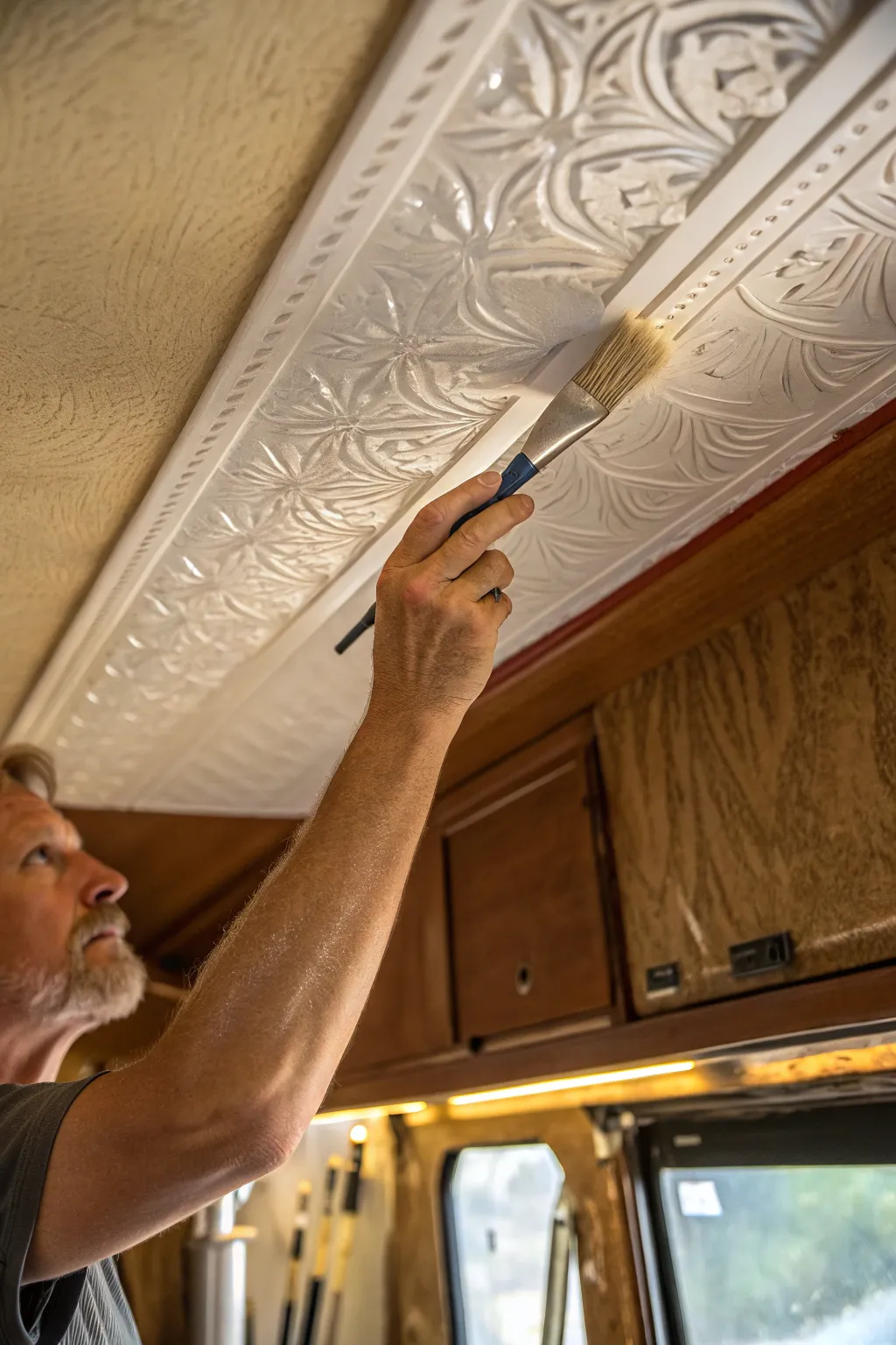Transform your RV ceiling with the artistry of textured paint, adding depth and character with every brush stroke.