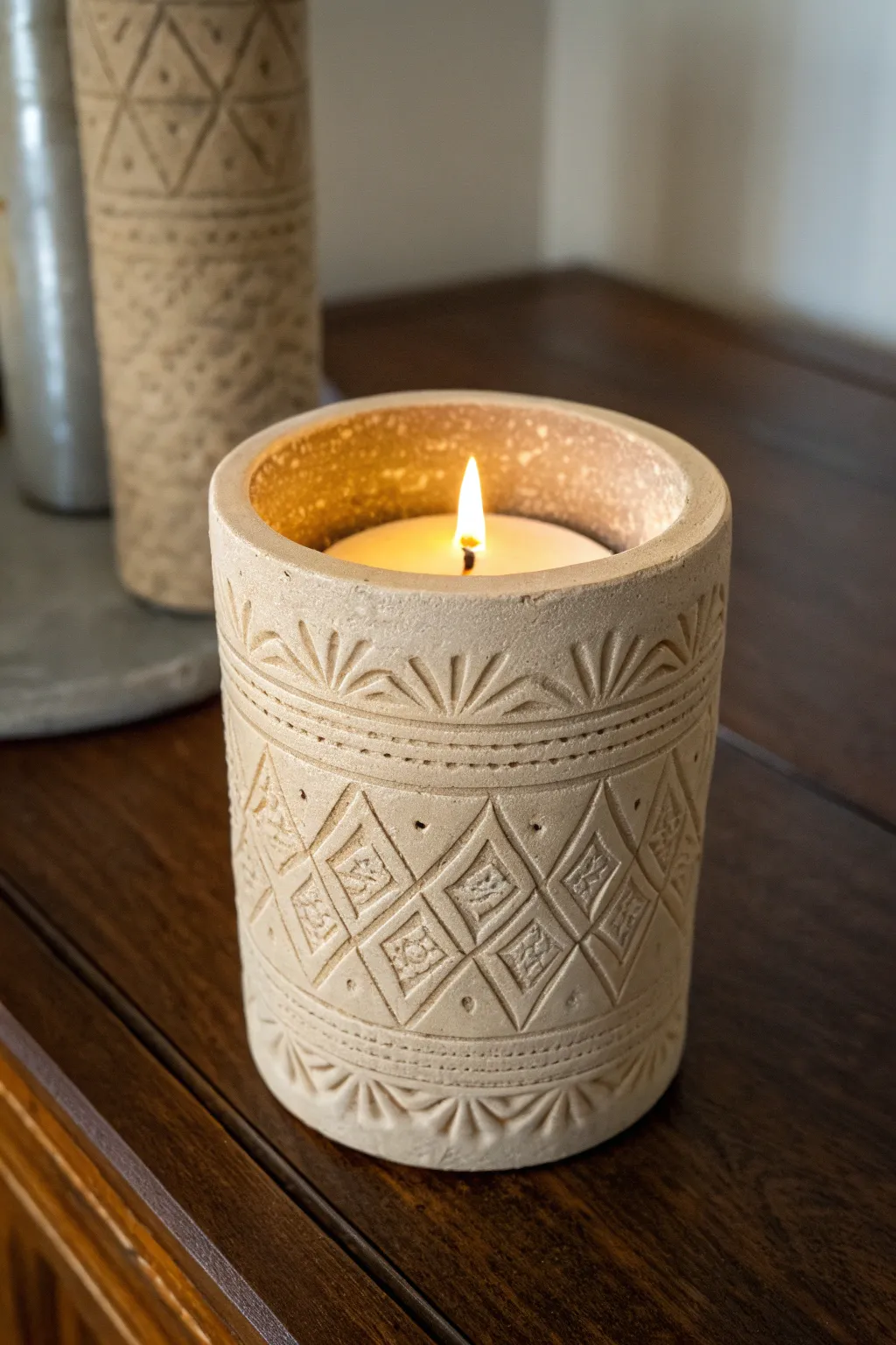 Illuminate your space with the artistry of handcrafted textured candle holders.