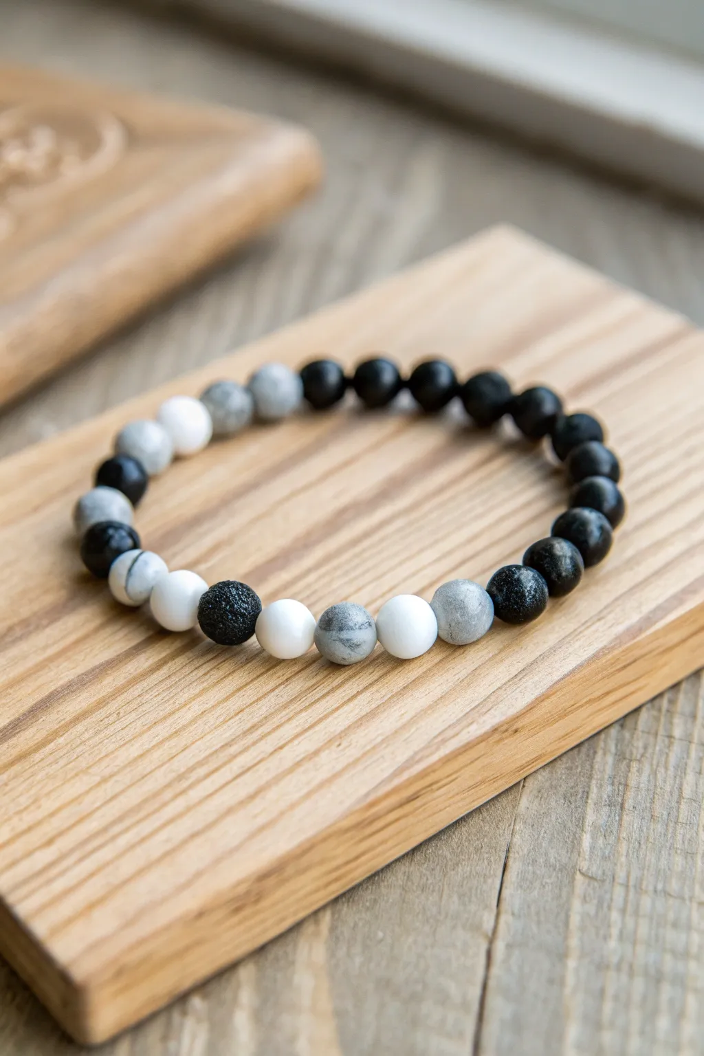 Embrace understated elegance with a minimalist monochrome bead bracelet that complements any style.