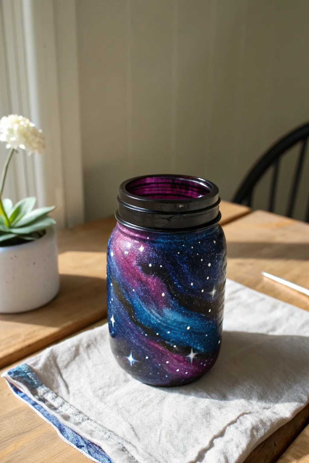 Capture the cosmos in a jar: Create your own galaxy magic with this simple, enchanting DIY project.