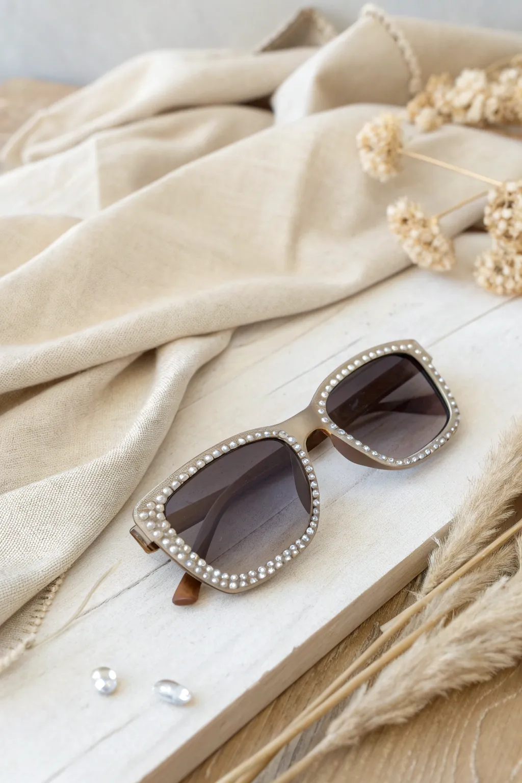 Elevate your style with these chic bedazzled sunglasses—where minimalism meets a touch of sparkle.