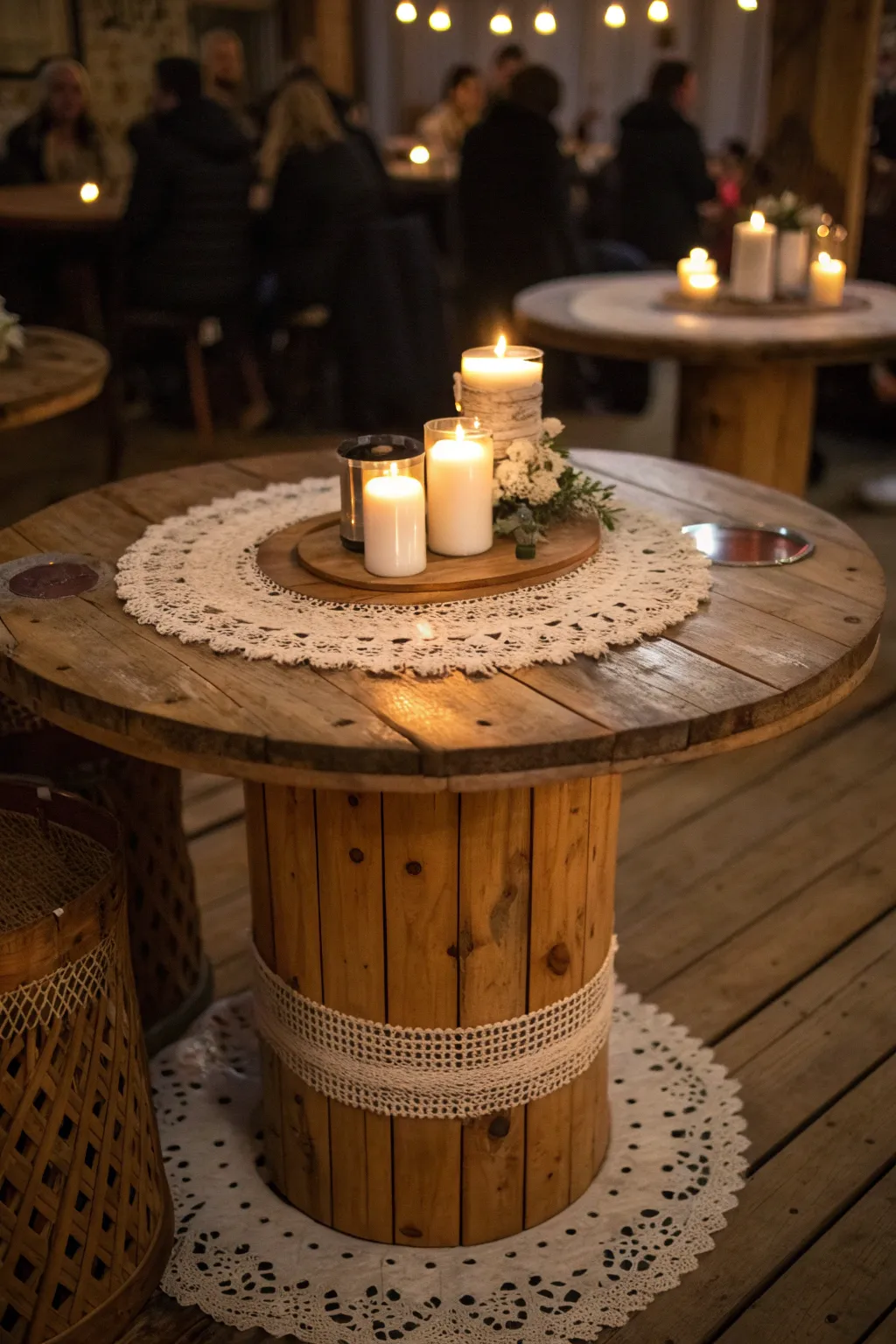 Embrace the warmth of rustic charm with this beautifully crafted wooden spool table, perfect for cozy gatherings.
