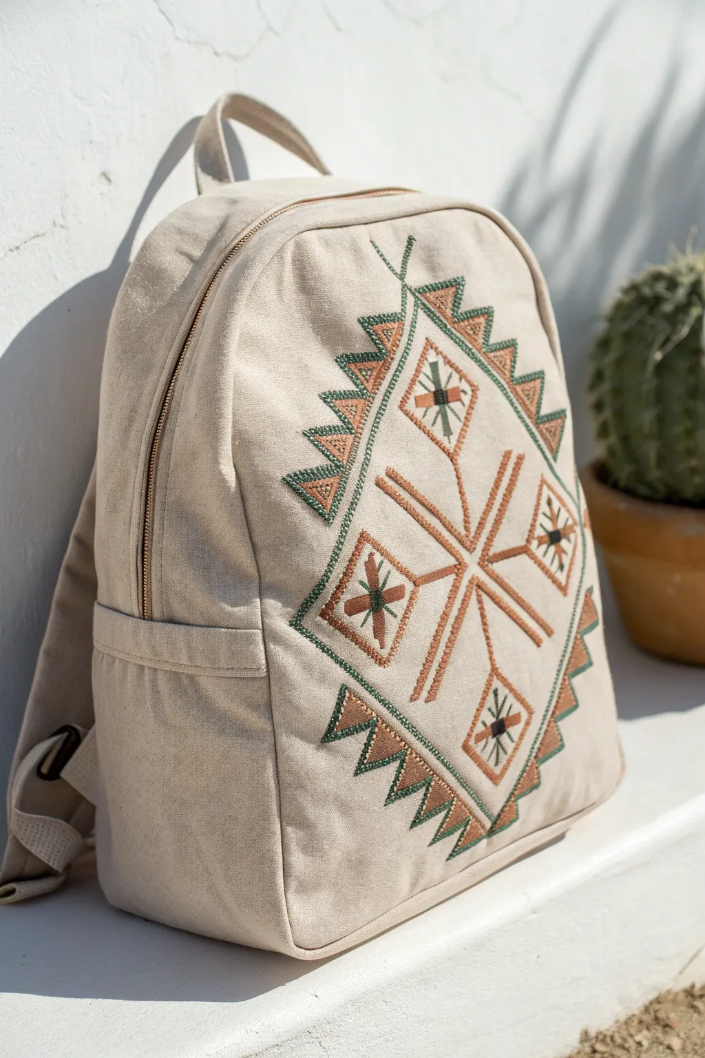 Transform your backpack into a modern masterpiece with geometric embroidery. Embrace simplicity and craft in every stitch.