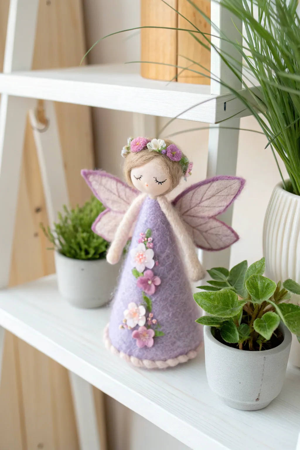 Whisk yourself away to a world of whimsy with this enchanting needle-felted fairy, a perfect blend of Scandinavian simplicity and Boho charm.