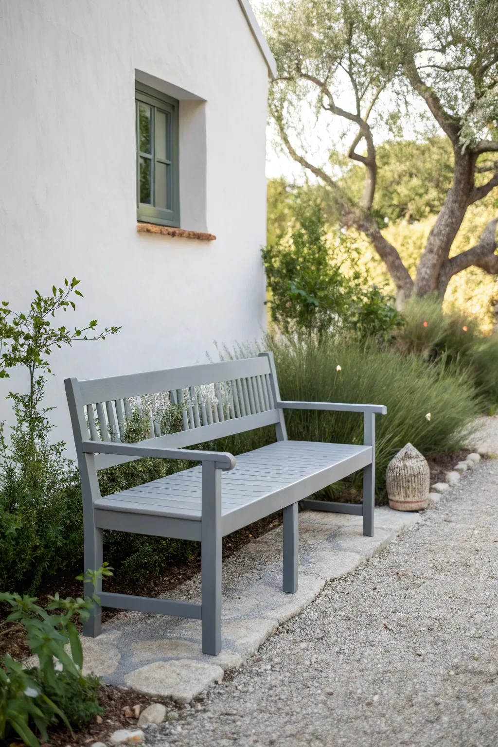 Embrace simplicity with a sleek monochrome bench that transforms your outdoor space into a serene retreat.