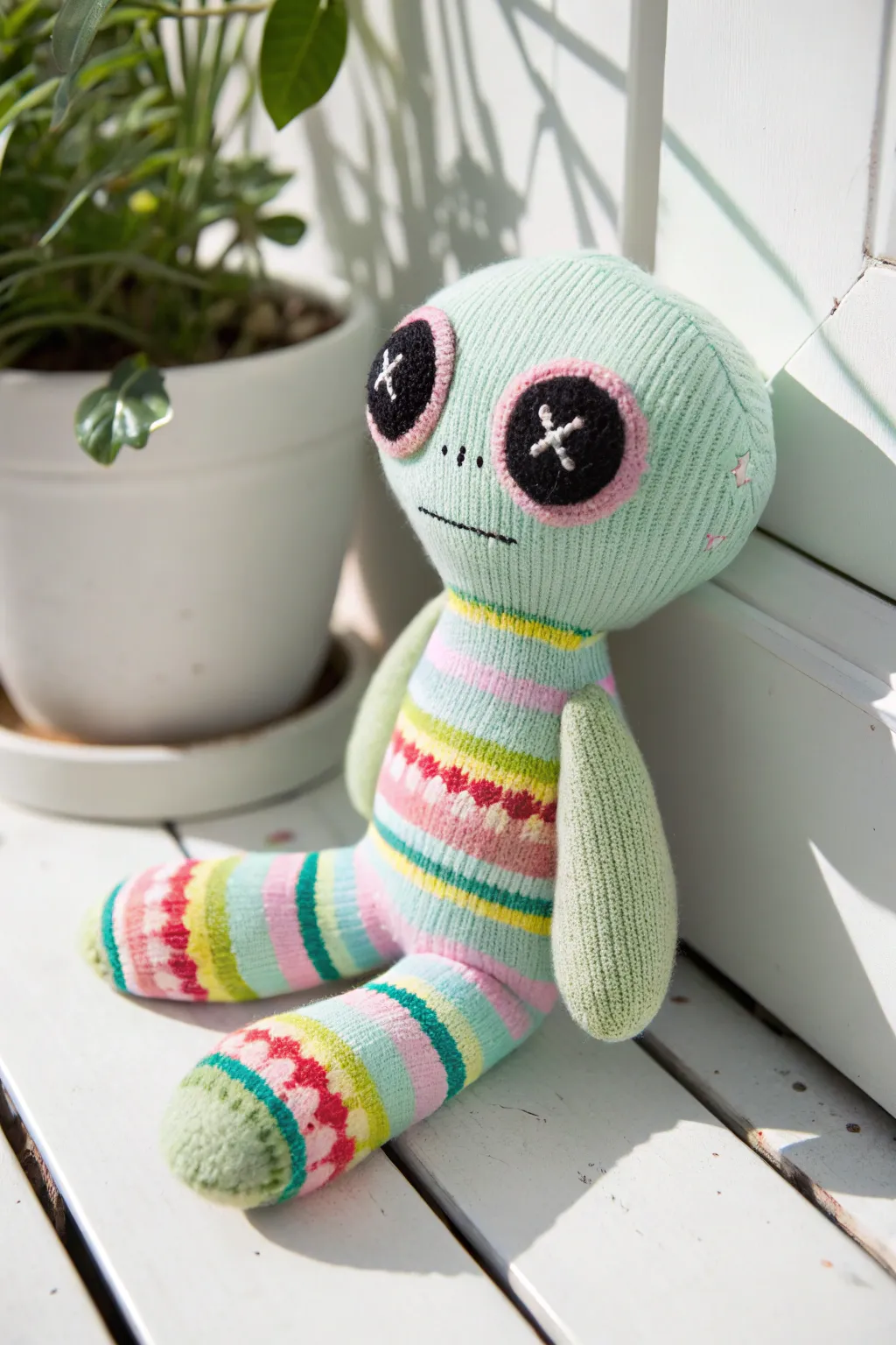 Meet your new cosmic companion: a charming sock alien that's out of this world!