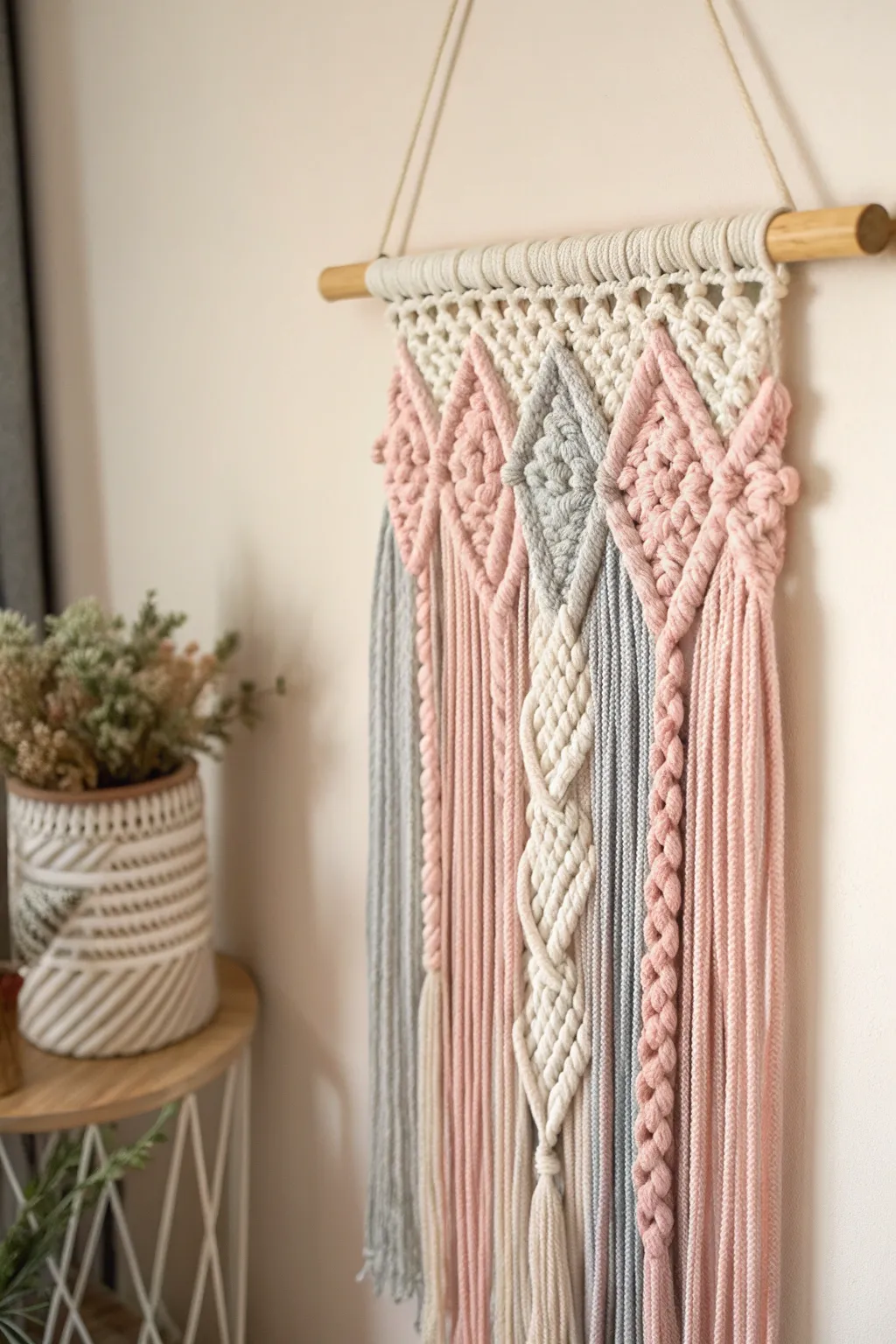 Elevate your space with the cozy elegance of handcrafted yarn wall hangings. Perfect for adding a touch of warmth and style.