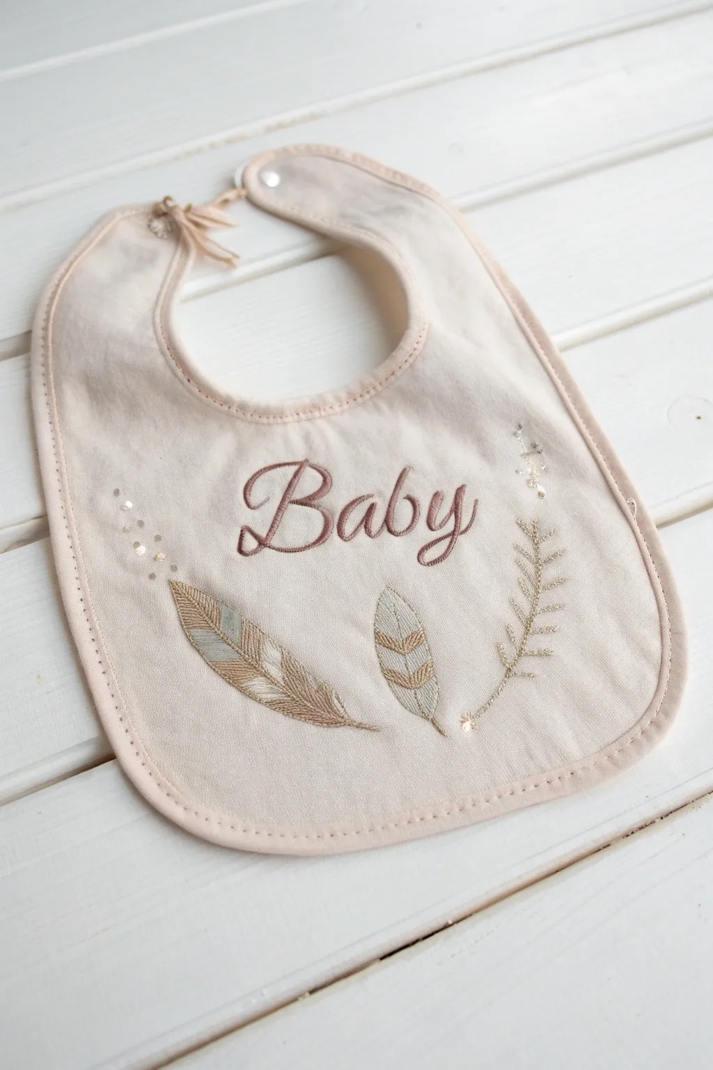 Add a heartfelt touch with a personalized baby bib—practical, beautiful, and cherished forever.