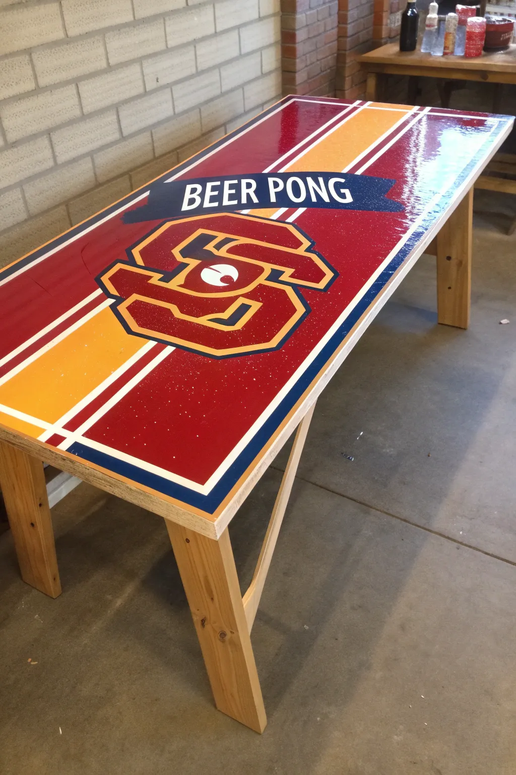 Elevate your game: A handcrafted sports-themed beer pong table that showcases team pride and craftsmanship.