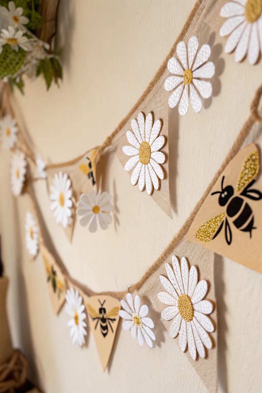 Add a touch of whimsy to your space with this handcrafted bee and flower garland.