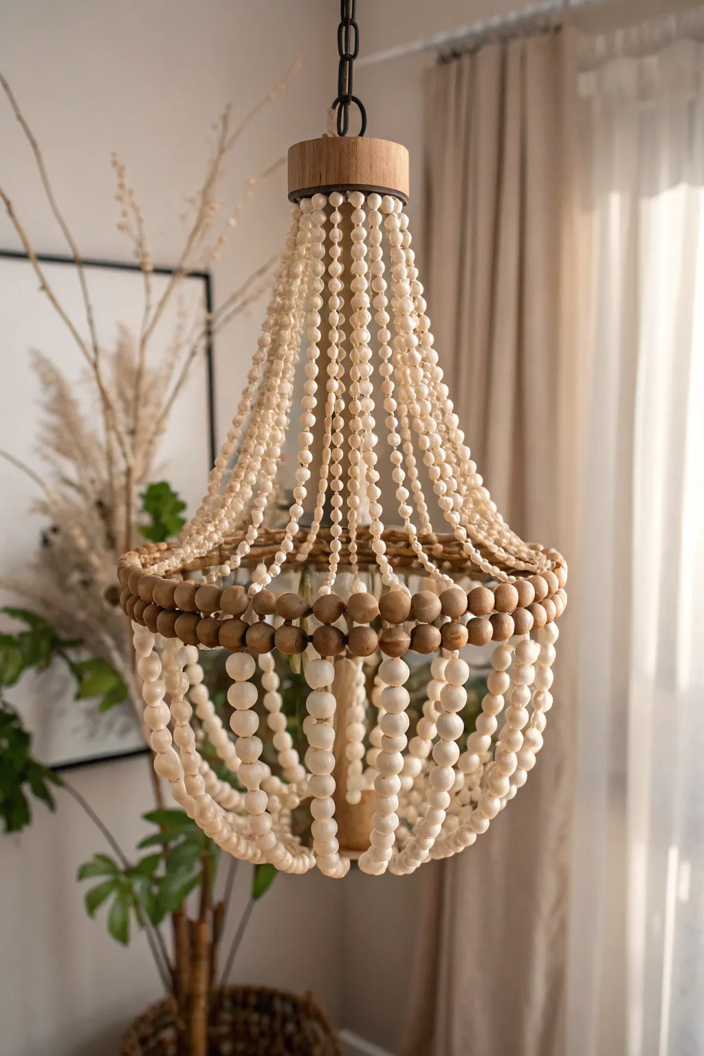 Transform your space with a touch of boho elegance using wood bead accents for your chandelier.