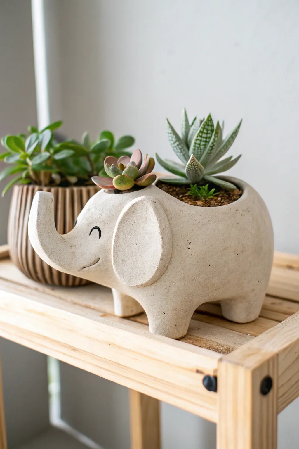 Bring the wild indoors with this charming clay elephant planter—perfect for your succulents!