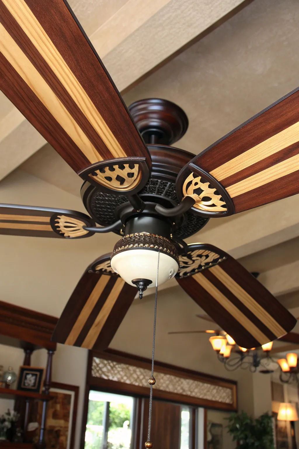 Elevate your space with striped sophistication: a crafted touch for your ceiling fan.