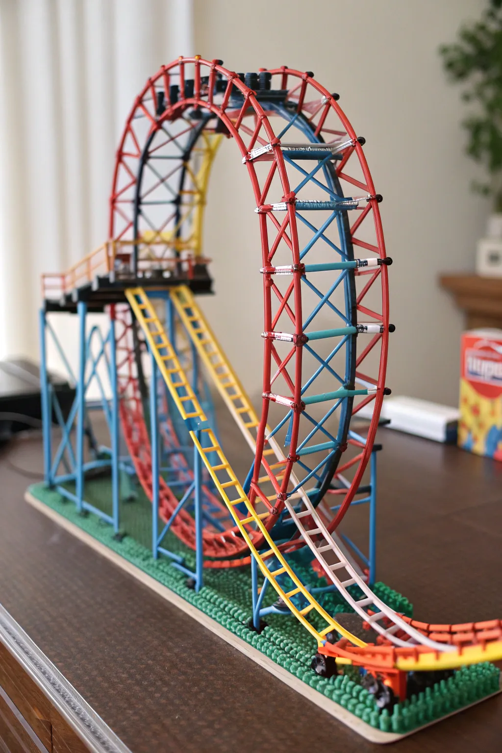 Craft your own adventure: A straw roller coaster masterpiece in the making.