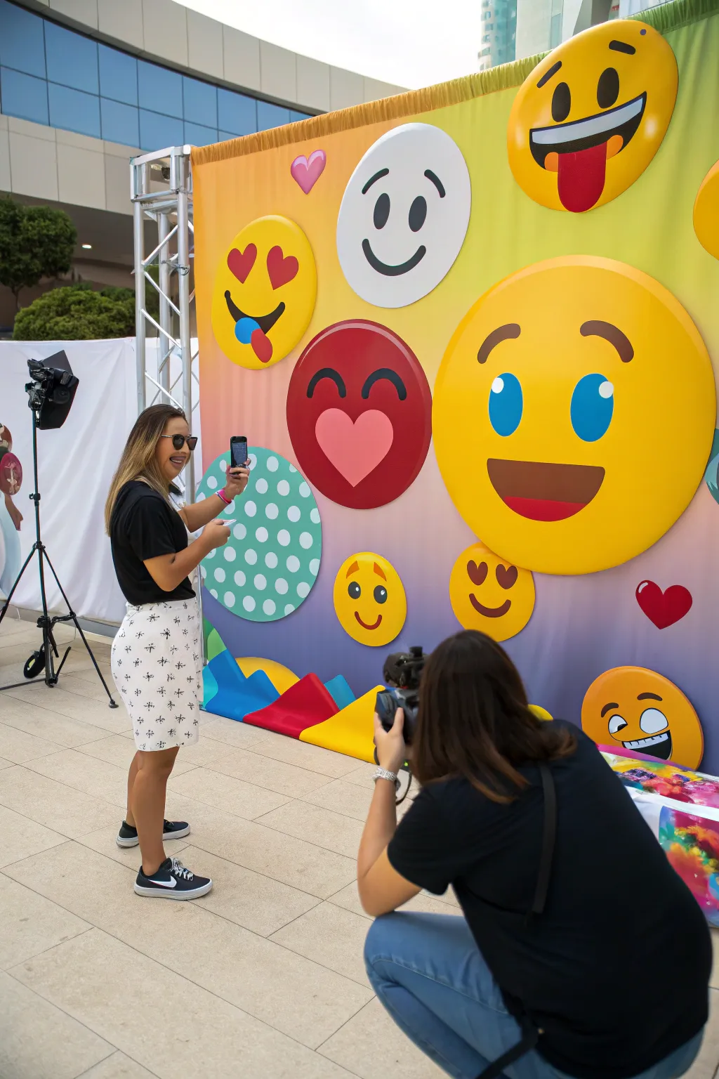 A colorful emoji-themed backdrop perfect for capturing party memories.